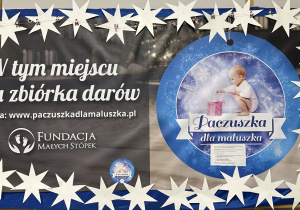 Tablica informująca o zbiórce darów