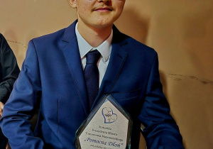 Mikołaj Więckowski z nagrodą